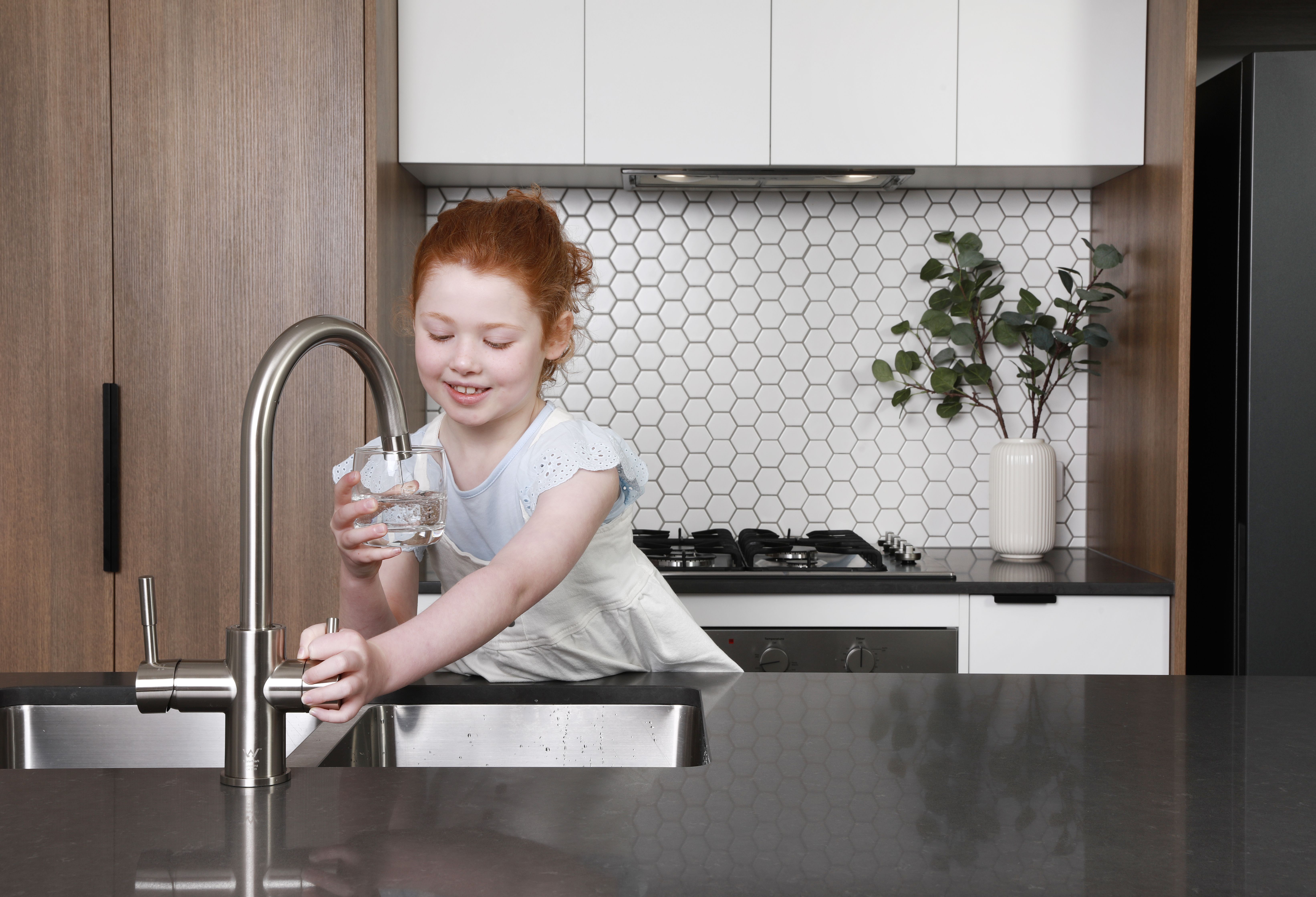 Why this matters to you and your family - Family enjoying clean Puratap filtered water